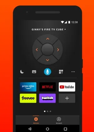 Smartphone with Fire TV app open, showing remote control interface.