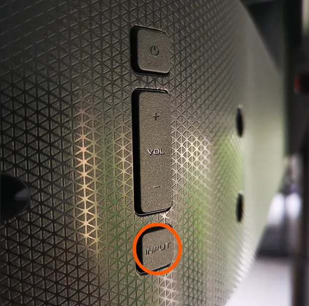 Vizio TV with physical buttons highlighted.